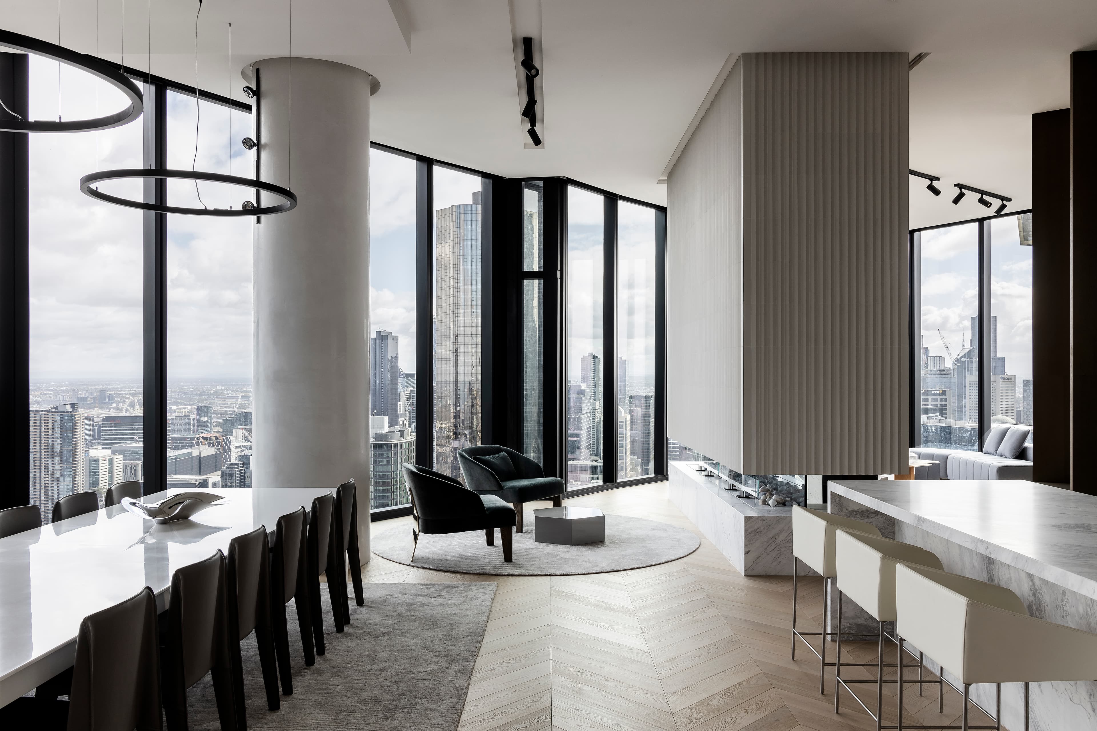 MSQ1 penthouse dining and living interior with city views